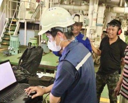 Measurement results reviewed on a laptop in the engine room